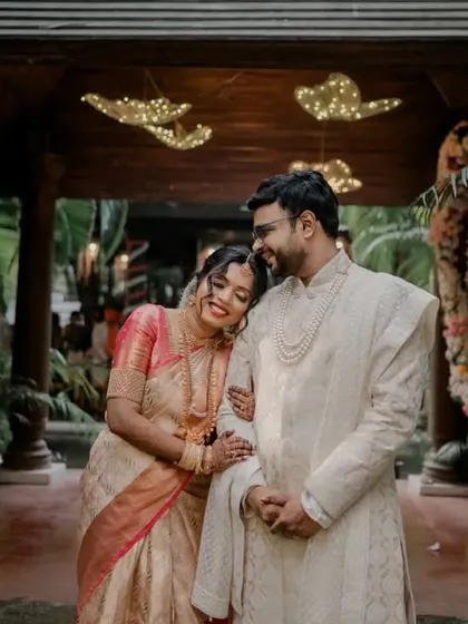 A quiet moment of togetherness for the couple amidst the wedding festivities at a beautiful resort venue.