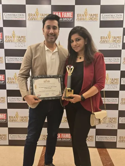 Posing with our trophy and certificate from the Era Fame Awards. We are grateful for this recognition and motivated to continue creating inspiring landscapes.