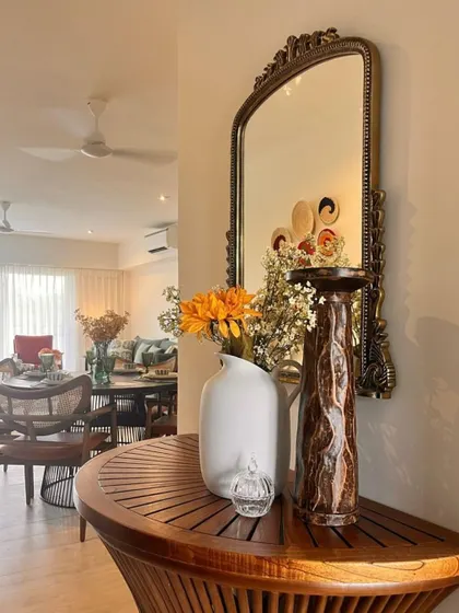 A sneak peek of the interior styling at Vista Arrozal. A vintage-style mirror and curated vases hint at the eclectic, warm aesthetic of the finished home.