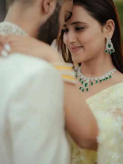 A close-up, intimate portrait that feels both romantic and timeless. The focus is entirely on the couple's connection.