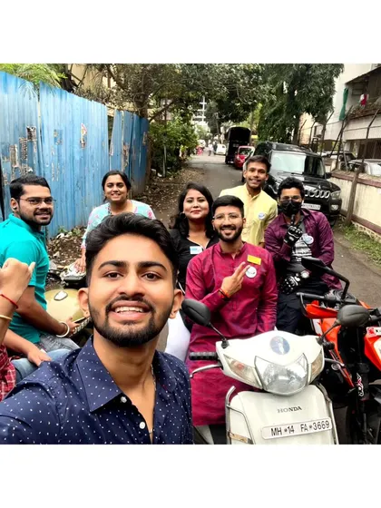 Getting ready to explore Pune on scooters with the local Rotaract club members.