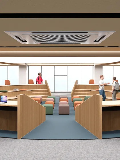 A tiered classroom at Heritage Xperiential Learning School with flexible seating in the center. This layout allows the space to be easily adapted for lectures, group discussions, or collaborative projects.