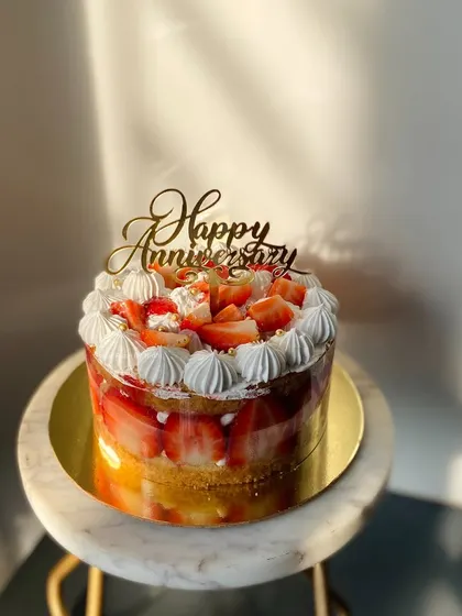 My Strawberry Fraiser cake is a seasonal favorite. It's made with layers of fresh strawberries and light cream, perfect for celebrating an anniversary or any special day.