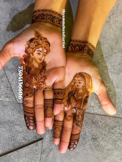 A close-up shot of the Radha-Krishna portraits, emphasizing the fine lines and shading details.