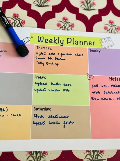 The weekly planner, all filled out with a schedule and notes for the week.