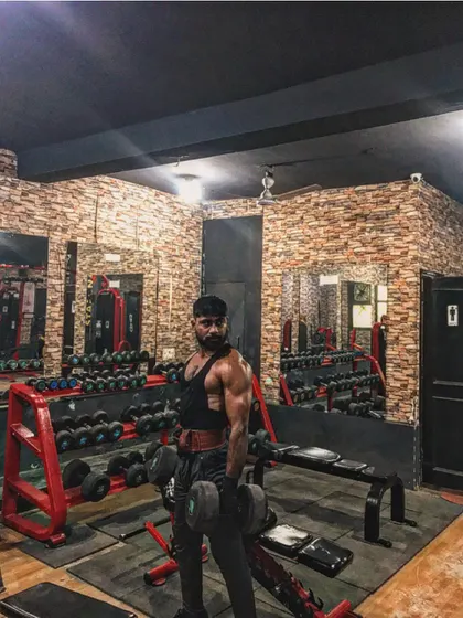 Men of steel. Getting ready for some heavy dumbbell work.