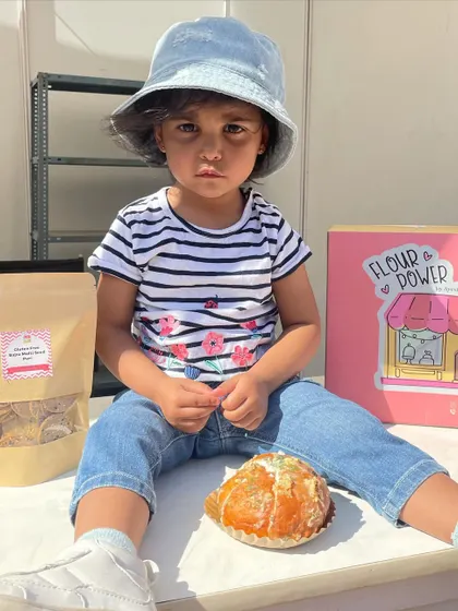 This little one is ready to dig into a Korean Cream Cheese Bun. My bakes are loved by customers of all ages.