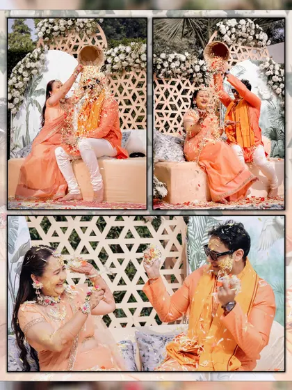 The playful side of Haldi, with the couple showering each other with flower petals and turmeric.