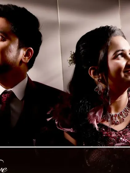 A dramatic, beautifully lit portrait of the couple, designed as a feature page in their engagement album.