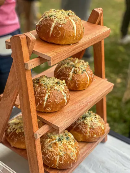 My Korean buns displayed on a tiered stand at a food market. They are always one of the first things to sell out.