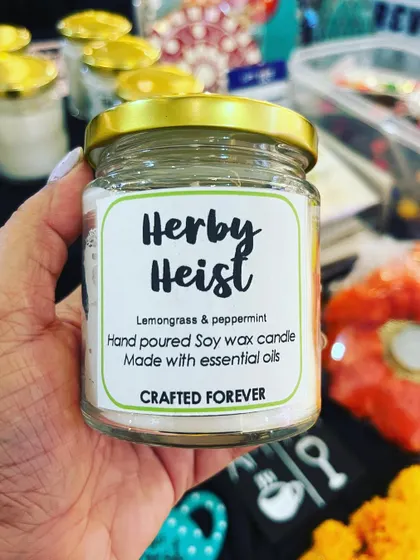 My "Herby Heist" candle is a refreshing blend of lemongrass and peppermint. It's perfect for clearing your mind and energizing your space.