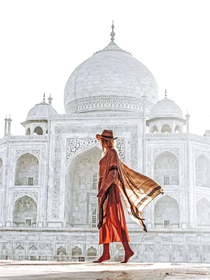 While I'm known for moody shots, I can also deliver clean and bright travel portraits. This image uses natural light to create an airy, elegant portrait at an iconic location.