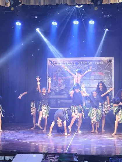 The tribal dancers use the entire stage, creating a dynamic and immersive performance.