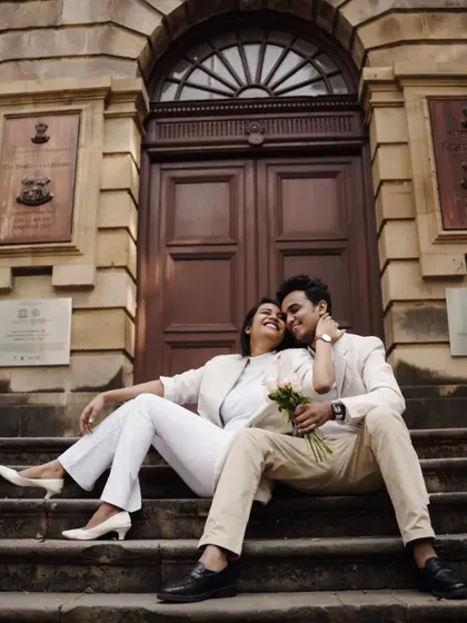 Another beautiful, happy moment on the steps. Their genuine smiles and comfortable poses show how relaxed they were during the shoot.