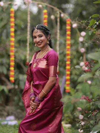 An outdoor portrait of the bride. The natural setting complements her simple and elegant look.