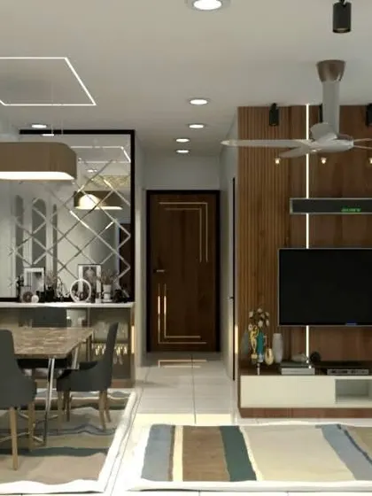 A comprehensive view of the living and dining space, showing how all the custom furniture elements come together in this turnkey interior project.