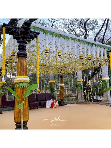 Another view of the elegant South Indian wedding setup. The clean lines of the decor, combined with traditional elements, create a serene and sophisticated atmosphere for the celebration.