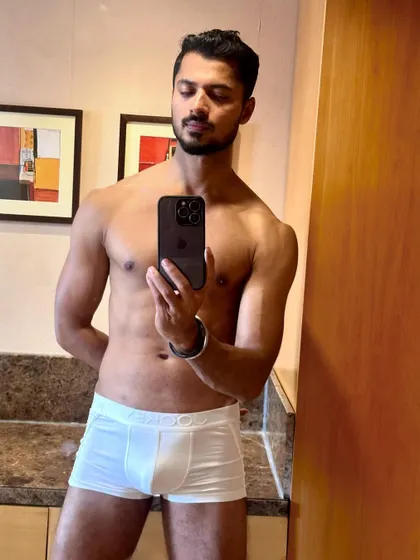 A relaxed pose, demonstrating a natural and healthy body shape.