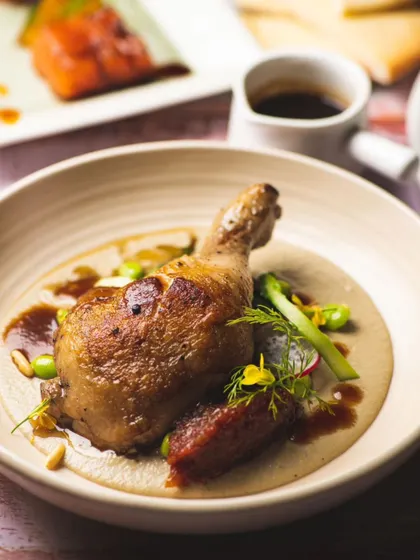 Another look at my perfectly cooked duck leg confit, a highlight of my European-inspired menu.
