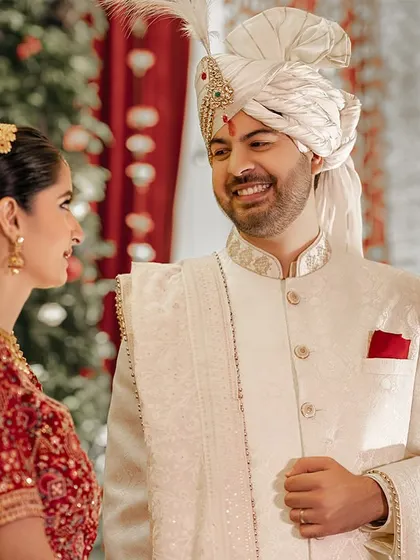A close-up of the groom's happy smile as he looks at his bride. These are the candid moments I love to capture.