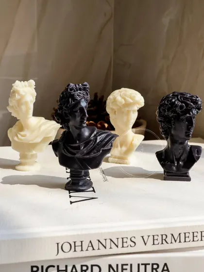 Another view of the black and white Roman bust candles. They make for a very chic and artistic decor statement.