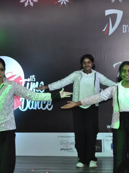 A trio of dancers strikes a pose during their performance at the Winter Dance Showcase.
