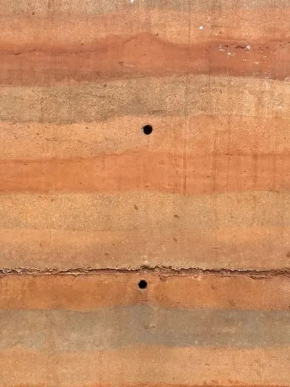 The subtle variations in color and texture make each rammed earth wall a unique piece of art.