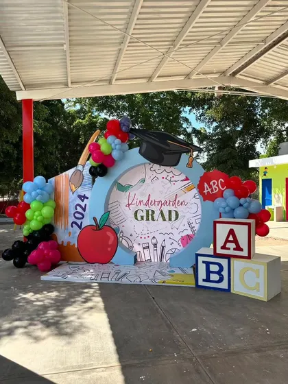 Another view of the kindergarten graduation photo booth, a colorful and fun setup to celebrate a big achievement.