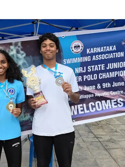 Roshini S receiving the 'Best Player' award at the NRJ State Junior Water Polo Championship. Her individual achievement is a testament to her skill and our effective coaching.