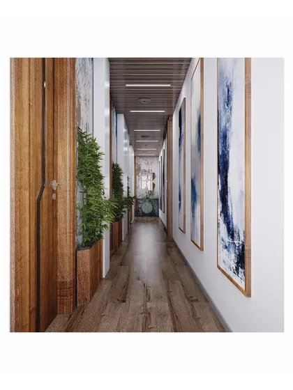This render shows our visualization of the corridor, focusing on the rhythm created by the framed art and the warmth from the wooden doors and planters.