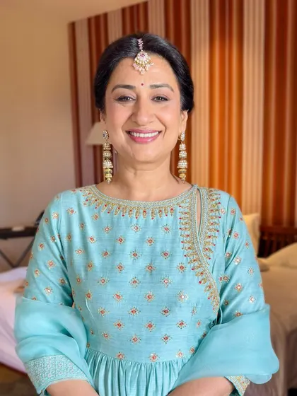The final look is simple, serene, and elegant, just like her. It’s an honor to get the mothers of the bride and groom ready for such a special day.