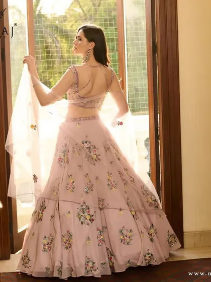 A final look at the pink floral crop top lehenga, a perfect blend of elegance and contemporary style.