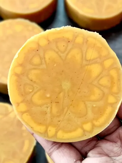 A close-up of a kaleidoscope soap, revealing the intricate, subtle pattern created by the ghost swirl.