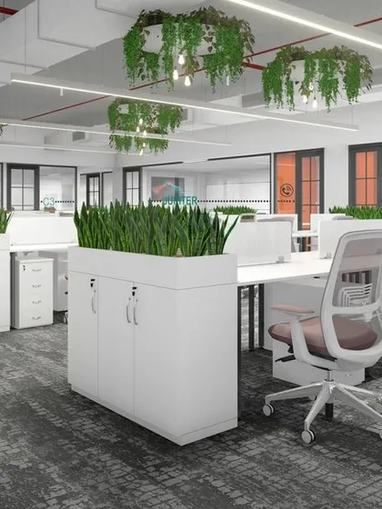 This render illustrates our concept for an open-plan office with biophilic design. We integrated planters into the desk systems and suspended greenery from the ceiling to create a healthier and more productive workspace.
