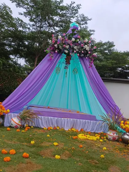 The full view of the purple and turquoise Mehendi tent, a unique and colorful addition to any outdoor event.