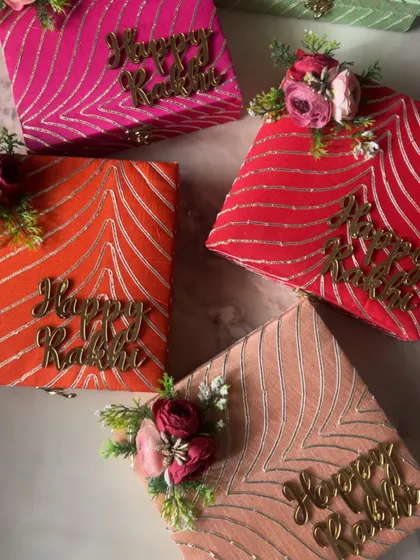 A collection of detailed shots and videos showcasing the variety of items, packaging, and happy moments from my Rakhi collection.