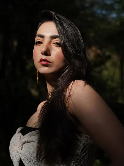 A close-up portrait where the sunlight hits just right. This photo has a warm, golden hour feel to it.
