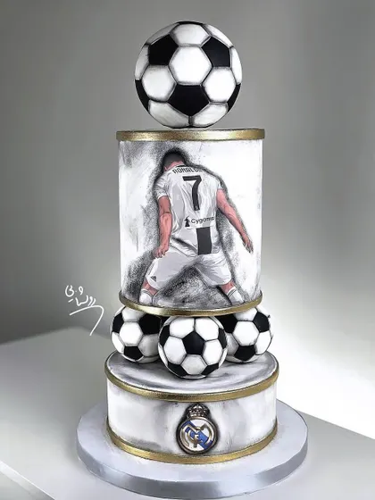 Another view of the extravagant football cake, perfect for a die-hard fan's celebration.