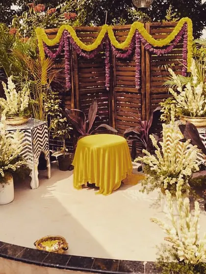 A simple yet beautiful Haldi setup on a home terrace, proving that intimate celebrations can be just as special.