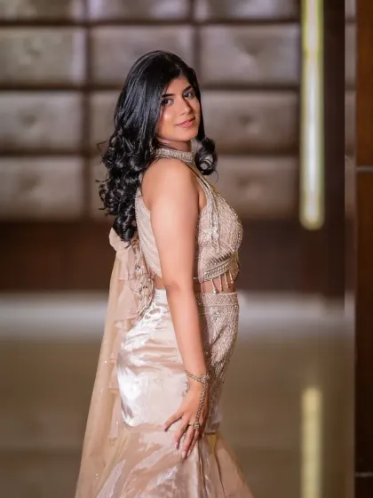 A beautiful portrait of the newly engaged bride-to-be. Her happy expression and elegant pose perfectly capture the excitement of the moment.