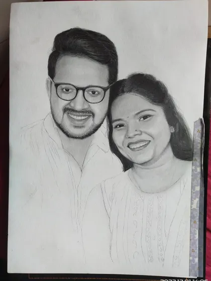 The couple's portrait is nearing the final stages. Both faces are shaded, and I am now refining the details and ensuring the likenesses are accurate.