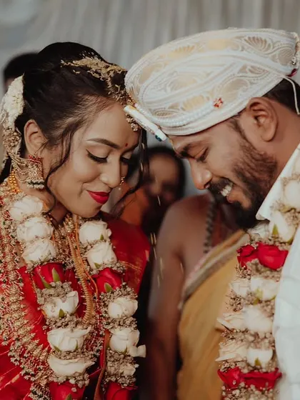 A precious moment between the bride and groom. My goal is to create a look that is not only beautiful but also withstands all the emotional and happy moments of the day.