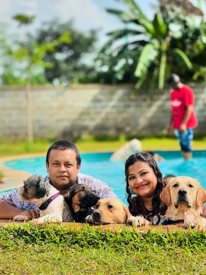 A perfect family portrait in the pool! We love seeing so many happy faces, both human and canine, enjoying the water together.