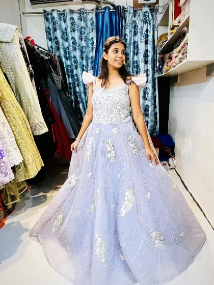This lavender gown is straight out of a fairytale. The embellished bodice and flowing skirt make it a perfect choice for a pre-wedding shoot or reception.