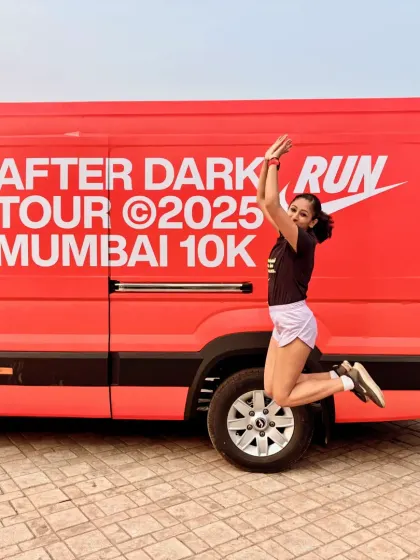 Another joyful jump in front of the Nike After Dark Tour van. I invite all women to join us and experience the magic of running together.