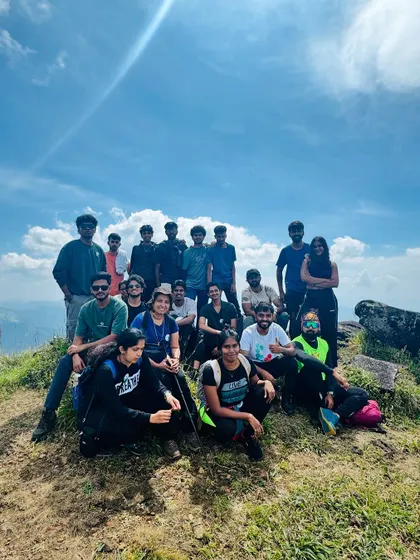 Another successful batch reaches a viewpoint on the Kumara Parvatha trek. The smiles say it all.