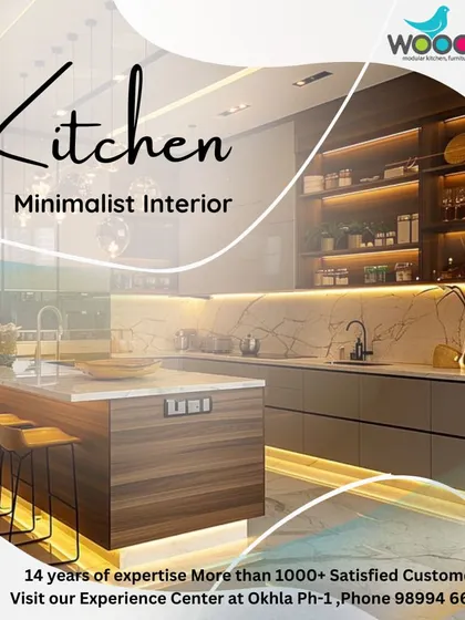 A kitchen is more than just a place to cook; it's the heart of the home. This minimalist kitchen design features a large island with seating, making it a perfect spot for the family to gather. We used a mix of wood textures and neutral tones to create a warm and inviting space.