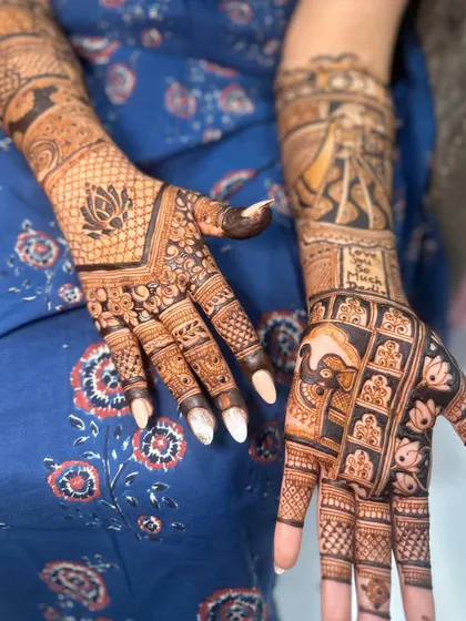 A side view of the bridal mehendi with a special message for 'Dadu'. The combination of personal text and traditional patterns is just beautiful.