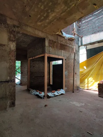 The 'box' structure seen from a different angle, showing how it will create a cozy nook within the open-plan layout.