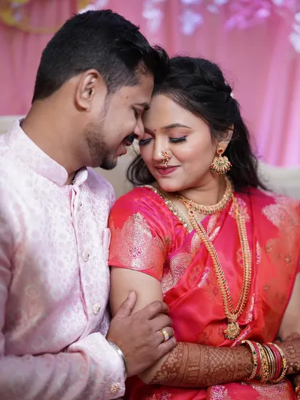 An intimate and romantic pose. This close-up shows the bride's soft, blended eye makeup and flawless skin, perfect for creating beautiful memories.